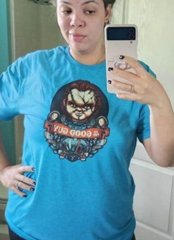 PCOS Sisters A woman in a blue t shirt taking a selfie before her PCOS Weight Loss Treatment